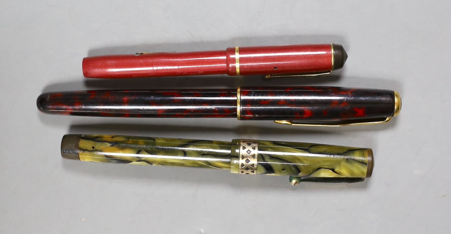 A Swan green marble fountain pen, together with a Parker Sonnet and “Dinkie” Conway Stewart pen (3)